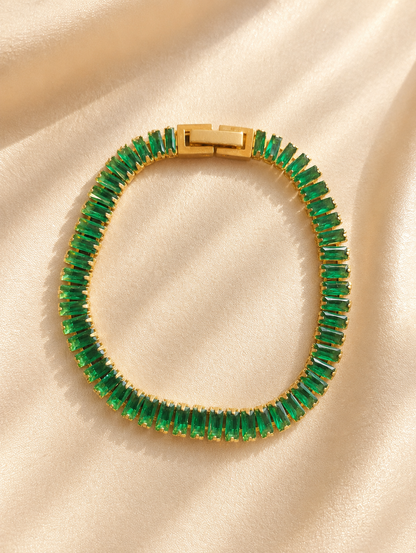 Brățară aurie tennis Glitterati Murmur Emerald  placată cu aur 18K, cu pietre cubic zirconia verzi din oțel chirurgical